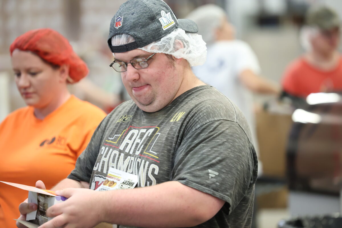 Young man with disabilities working at BCI